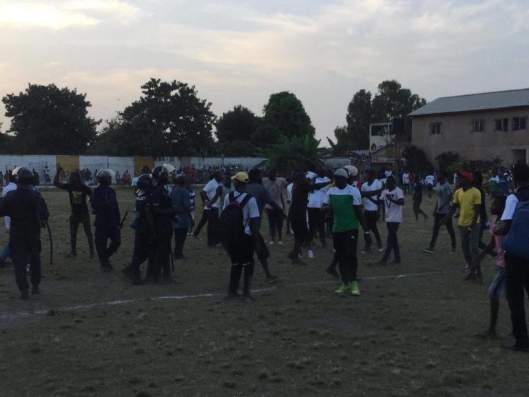 Police Fire Tear Gas at Supporters