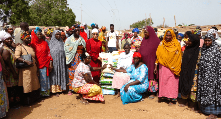 First Lady makes surprise visit to Denton Bridge to dole out food gifts to women at groundnut site