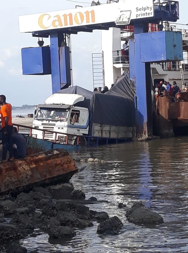 Ramp mishap sees heavy duty truck plunge into water disrupting ferry service