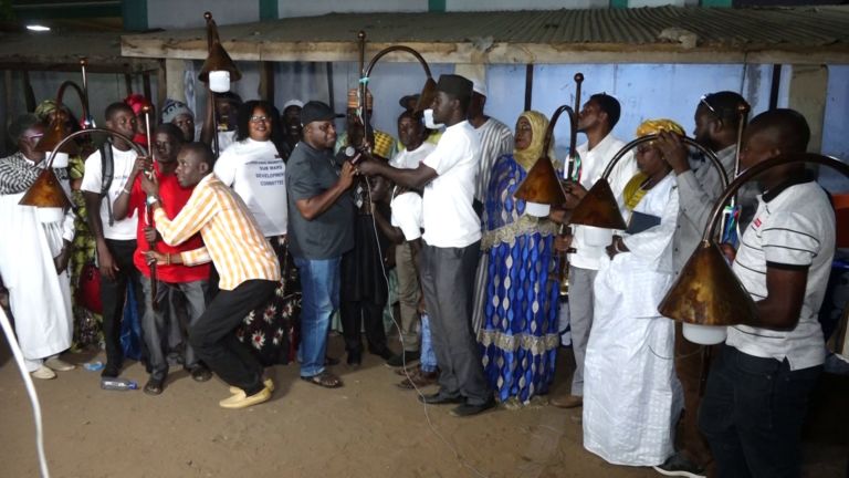 Bundung residents all smiles as lightening project is broadened from cemeteries to now homes