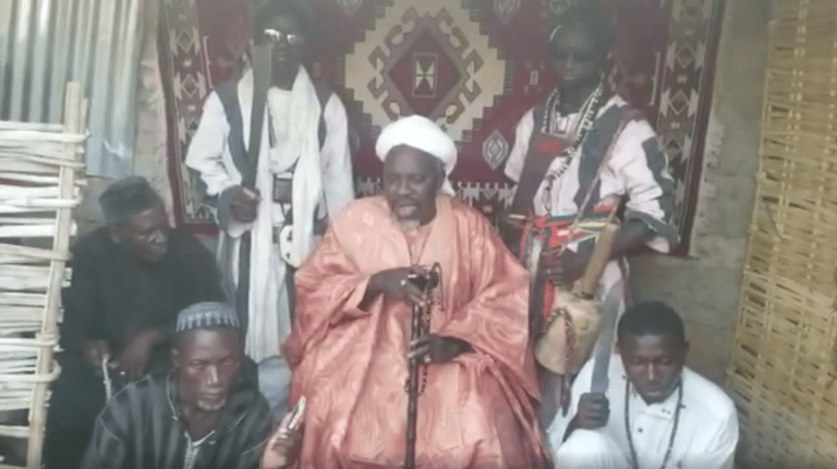 Bakawsu steps up bad blood between him and Imam Fatty in video where two machete-wielding students stood either side of him