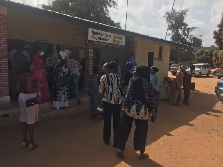 Crowd forms at Kairaba Police Station as charged Madi Jobarteh goes back to station for bail report