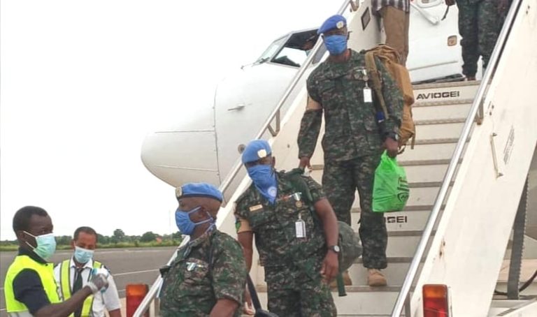 Temperature check is first item on agenda for Gambian troops as they return to the country from Darfur