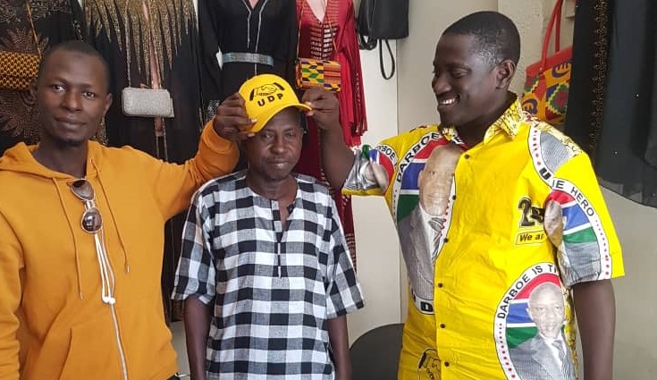 You’re now UDP! Sabally baptizes PDOIS man to UDP, officialises it by putting party’s cap on his head