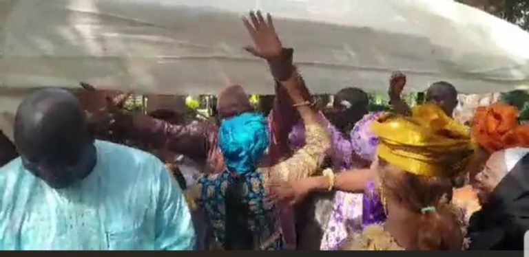 Happy President Barrow makes some dance moves as he fetes his NPP aides