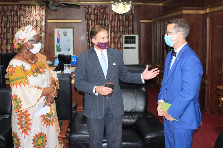 America’s support to Gambia set to expand as official jets into the country and meets vice president Dr Isatou Touray