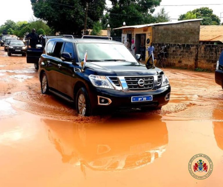 PR gets its fair share of the dirt as it carries President Barrow around in inspection of roads