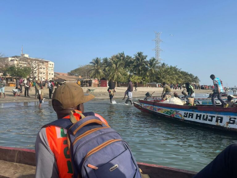 The Daily Struggle: Young Men at the Banjul-Barra Crossing Point