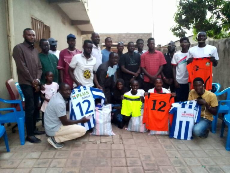 Bai Saine of Kerr Omar Saine Donates Football Jerseys to Boost Grassroots Sports in Jokadou”